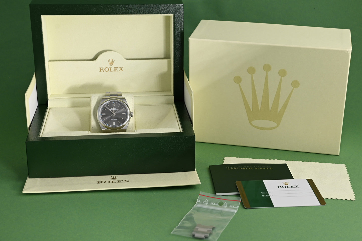 Rolex Oyster Perpetual 39mm 114300 - Grey - Box& Papers