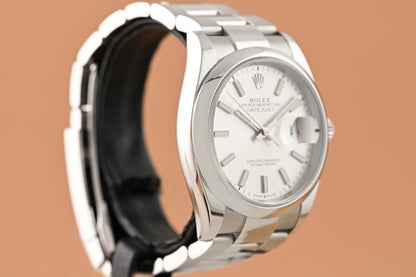 Rolex Oyster Perpetual Datejust 126200 - Full Set - Silver Dial - NEW