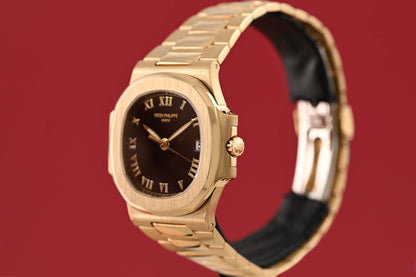 Patek Philippe Nautilus Gelbgold 3800/1J - Black Dial - Full Set