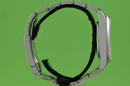 Rolex Oyster Perpetual 41mm 124300 - Full Set - Green Dial