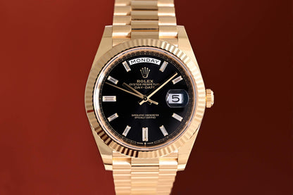 Rolex Day Date 40 Gelbgold 228238 - Full Set - Black Baguette Dial - Like NEW 2023