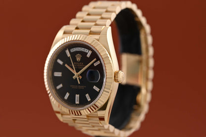 Rolex Day Date 40 Gelbgold 228238 - Full Set - Black Baguette Dial - Like NEW 2023