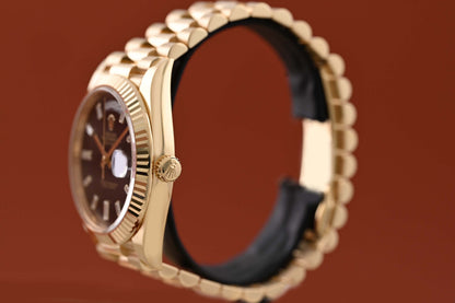 Rolex Day Date 40 Gelbgold 228238 - Full Set - Black Baguette Dial - Like NEW 2023