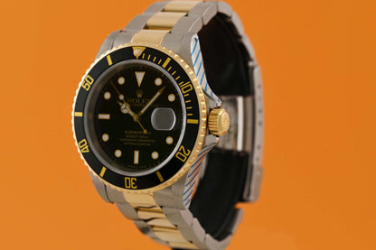 Rolex Submariner 16613LN Stahl/Gold - Black Dial - Rolex Service Card