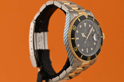 Rolex Submariner 16613LN Stahl/Gold - Black Dial - Rolex Service Card