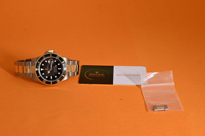 Rolex Submariner 16613LN Stahl/Gold - Black Dial - Rolex Service Card
