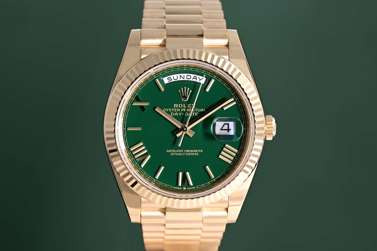Rolex Day Date 40 Gelbgold 228238 - Full Set - Green Dial - Like NEW 2025