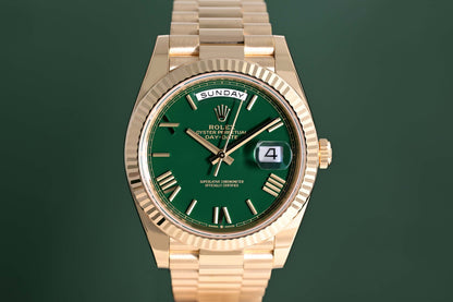 Rolex Day Date 40 Gelbgold 228238 - Full Set - Green Dial - Like NEW 2025