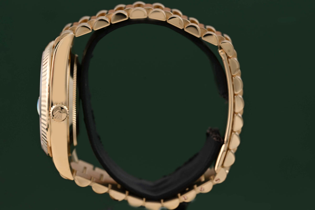 Rolex Day Date 40 Gelbgold 228238 - Full Set - Green Dial - Like NEW 2025