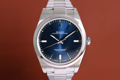 Rolex Oyster Perpetual 39mm 114300 - Blue - Box & Papers