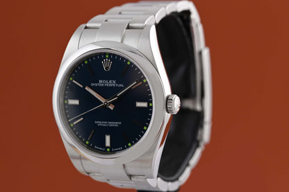 Rolex Oyster Perpetual 39mm 114300 - Blue - Box & Papers