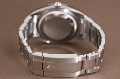 Rolex Oyster Perpetual Datejust 126200 - Full Set - Palm Motif Dial
