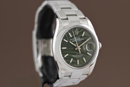 Rolex Oyster Perpetual Datejust 126200 - Full Set - Palm Motif Dial