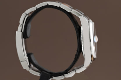 Rolex Oyster Perpetual Datejust 126200 - Full Set - Palm Motif Dial