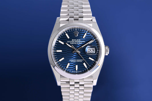 Rolex Oyster Perpetual Datejust 126200 - Blue Motif Dial - Full Set