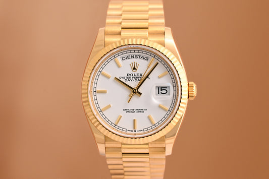 Rolex Day Date 36 Gelbgold 128238 - White Dial - Full Set
