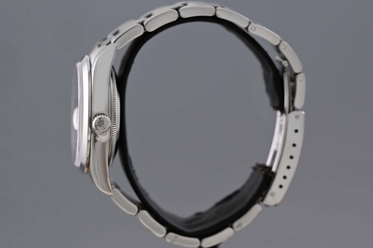 Rolex Oyster Perpetual Date - 15200 - White Dial