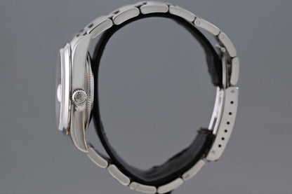Rolex Oyster Perpetual Date - 15200 - White Dial