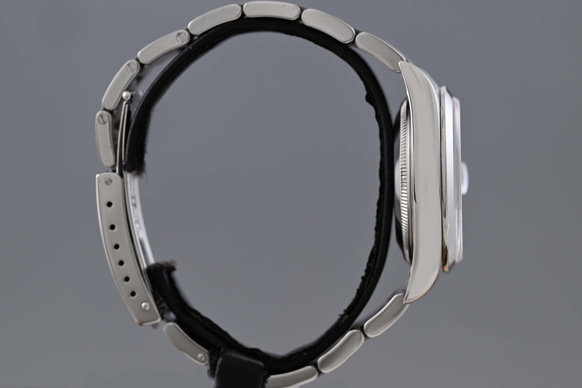 Rolex Oyster Perpetual Date - 15200 - White Dial