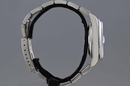 Rolex Oyster Perpetual Date - 15200 - White Dial